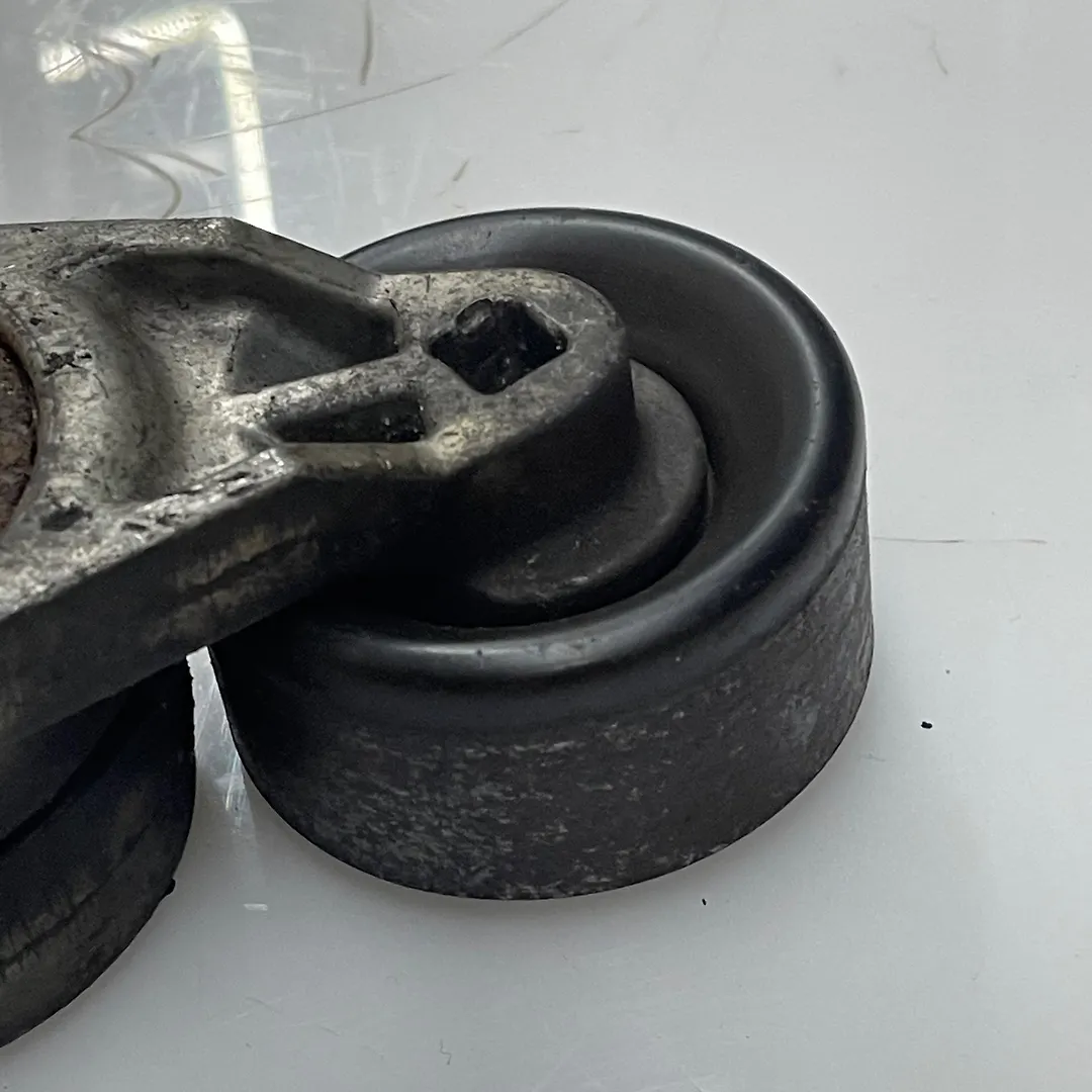 Belt tensioner - 2013 Nissan Pathfinder