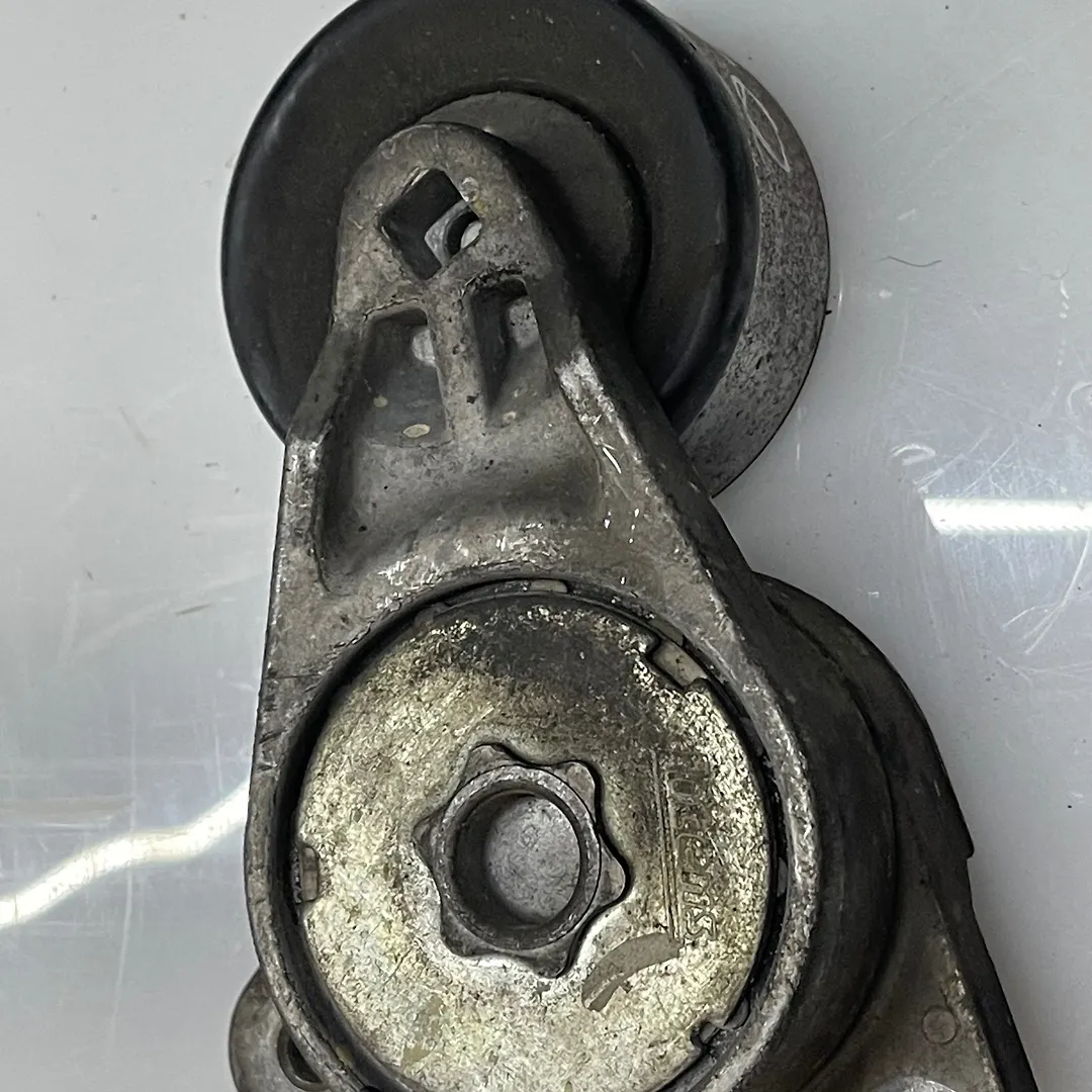 Belt tensioner - 2013 Nissan Pathfinder