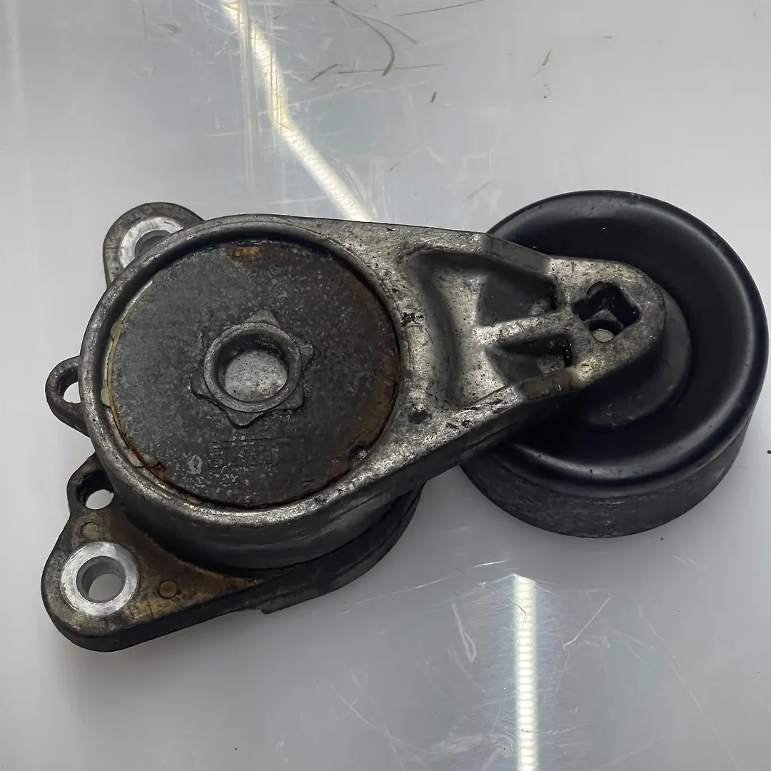Belt tensioner - 2013 Nissan Pathfinder